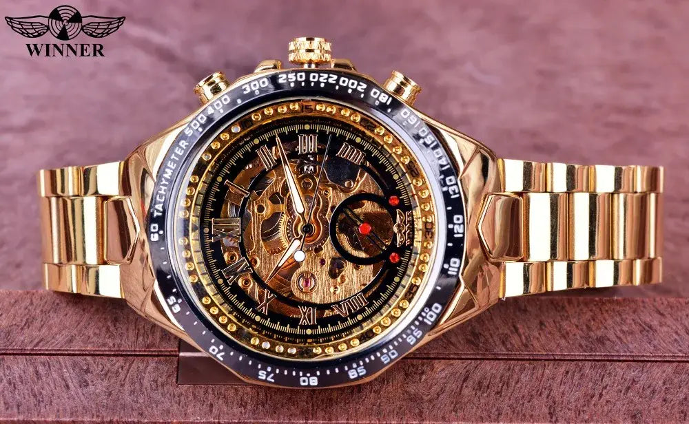 Gold-tone Winner Mechanical Sport chronograph watch with skeletonized face