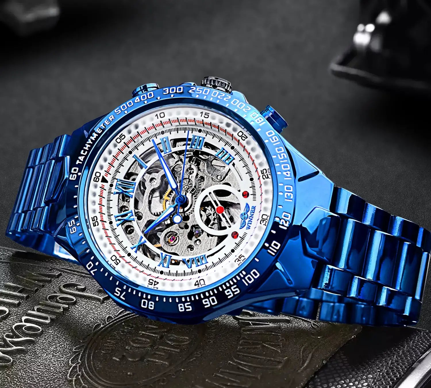 Vibrant blue Winner mechanical sport skeleton watch with bezel