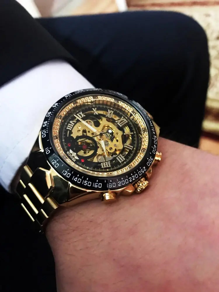 Gold Winner Mechanical Sport Skeleton Watch with Roman Numerals