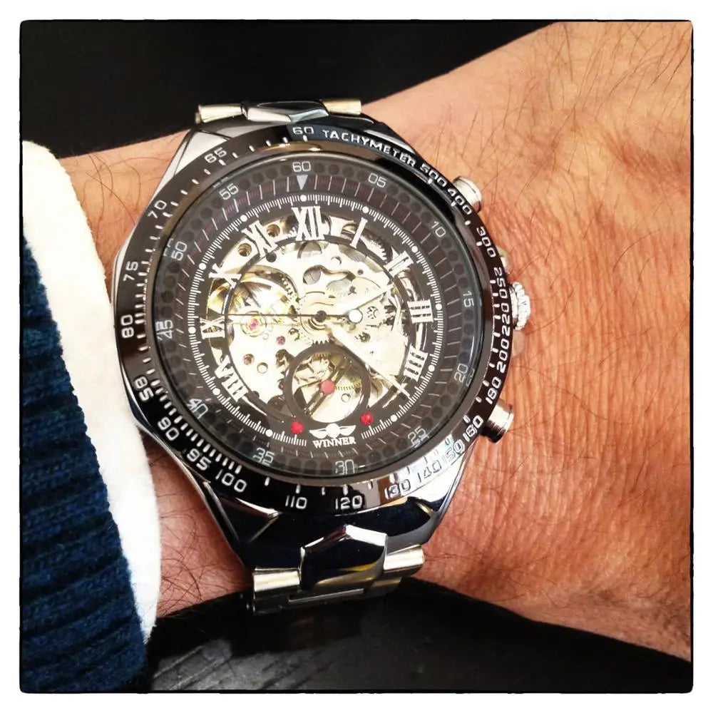 Sleek silver Winner mechanical sport skeleton watch with black dial and bezel