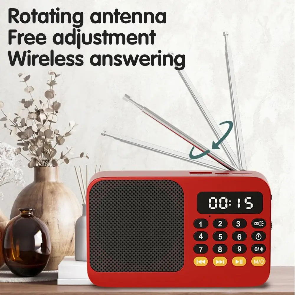 Red portable radio music player with digital LED display, keypad, and antennas