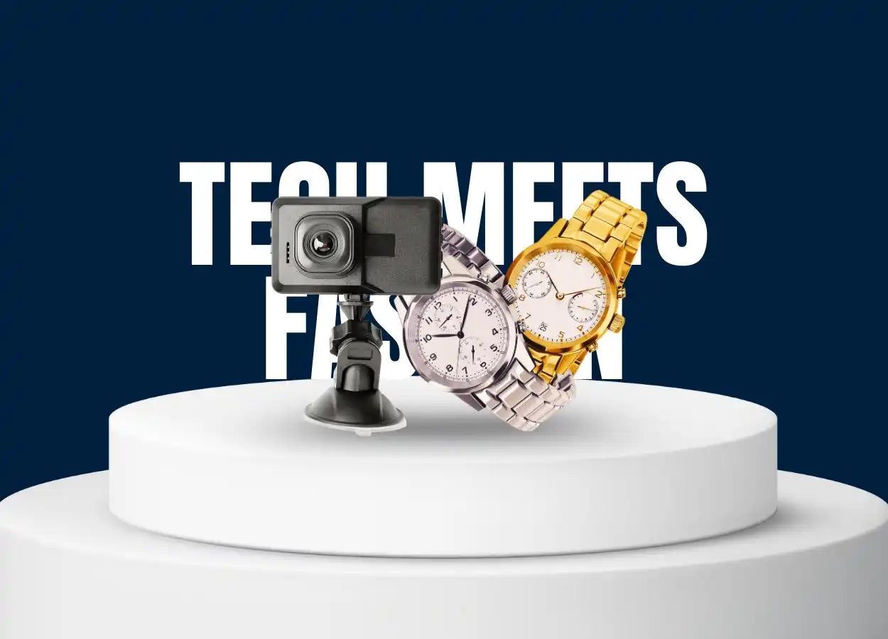 A dash camera and two wristwatches, one silver and one gold.